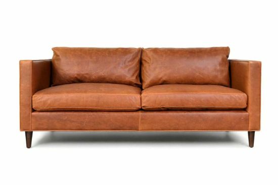 Lux & Borough Astoria style mid-century modern sofa with sloped track arms and tall tapered wood legs.