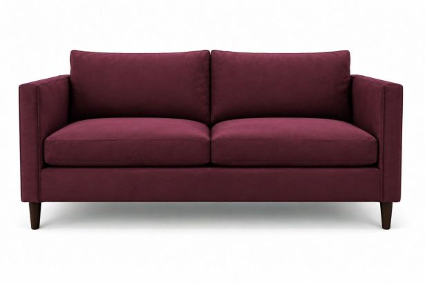 Lux and Borough Astoria style custom loveseat in a rich purple velvet fabric featuring a distinctive channeled vertical tufted backrest.