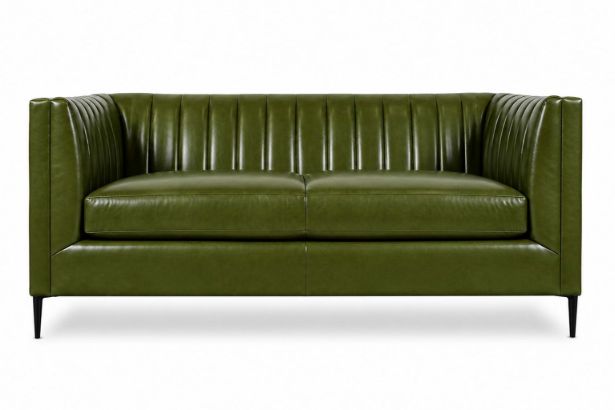 Lux and Borough Savoy style custom loveseat showcasing an elegant silhouette with tight tailoring, subtly flared rolled arms, a classic dressmaker skirt with corner pleats, and plush, deeply supportive seat cushions.