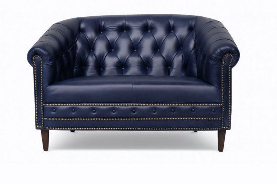 Lux and Borough Stafford style custom loveseat showcasing a grand camelback silhouette, elegantly rolled arms, tight tailoring, and a timeless full-length dressmaker skirt.