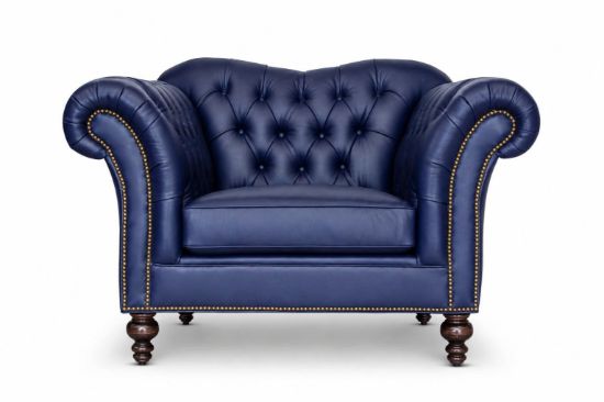 Lux and Borough Antoinette style custom accent chair featuring an undulating, contoured backrest with deep button tufting and exquisitely detailed turned dark wood legs.