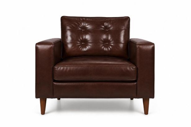 Lux and Borough Carlisle style custom armchair featuring an elegant high-back silhouette, gently sloping English roll arms, deep button-tufted backrest detailing, a thick tailored seat cushion, and dark turned wood front legs on metal casters.